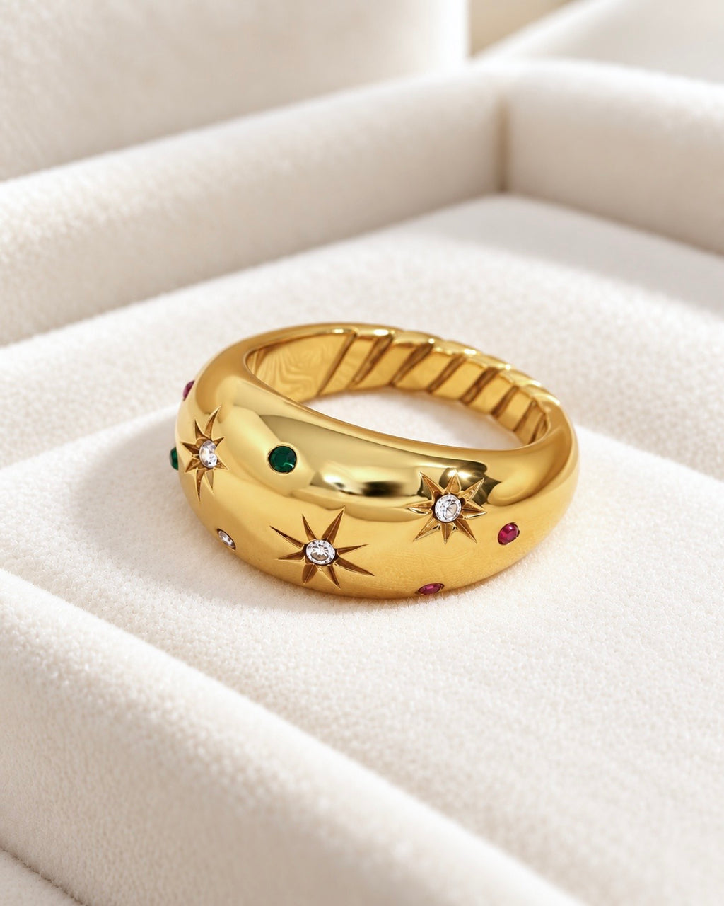 18K gold-plated chunky starburst ring with colourful cubic zirconia stones on cream velvet