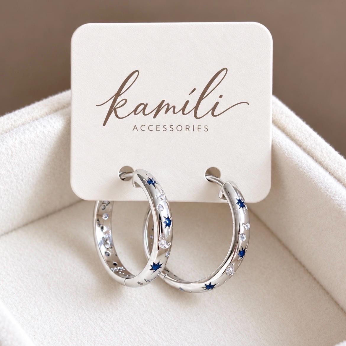 925 sterling silver celestial blue star CZ hoops displayed on Kamíli Accessories card