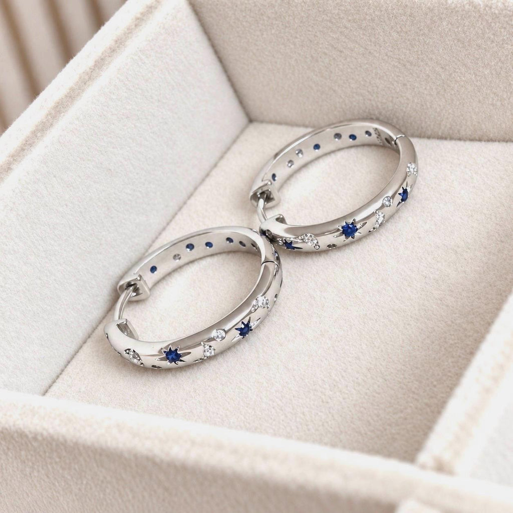 Silver celestial CZ hoop earrings on Kamíli Accessories jewellery card