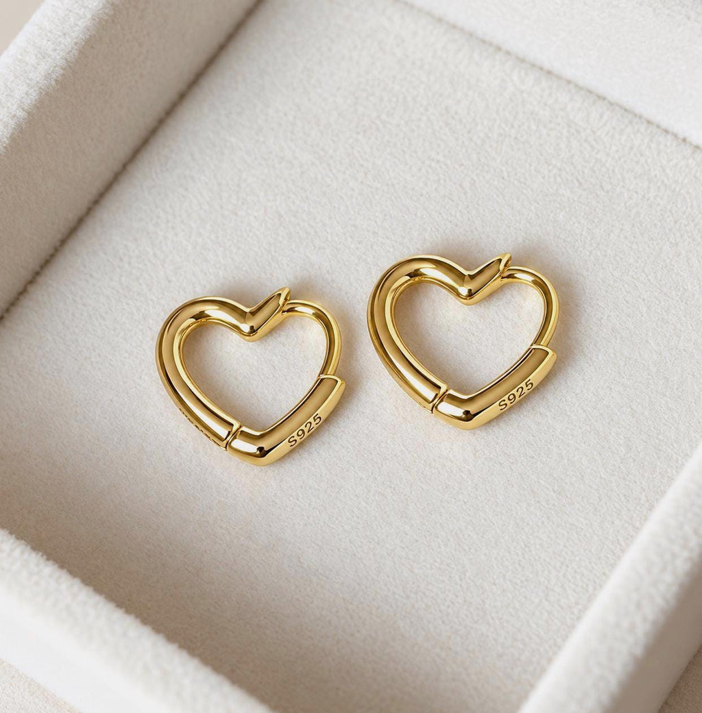 Reverse of gold plated heart shaped 925 sterling silver earrings showing S925 hallmark