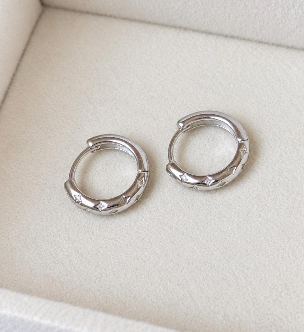 925 sterling silver star engraved cubic zirconia hoop earrings, front close-up