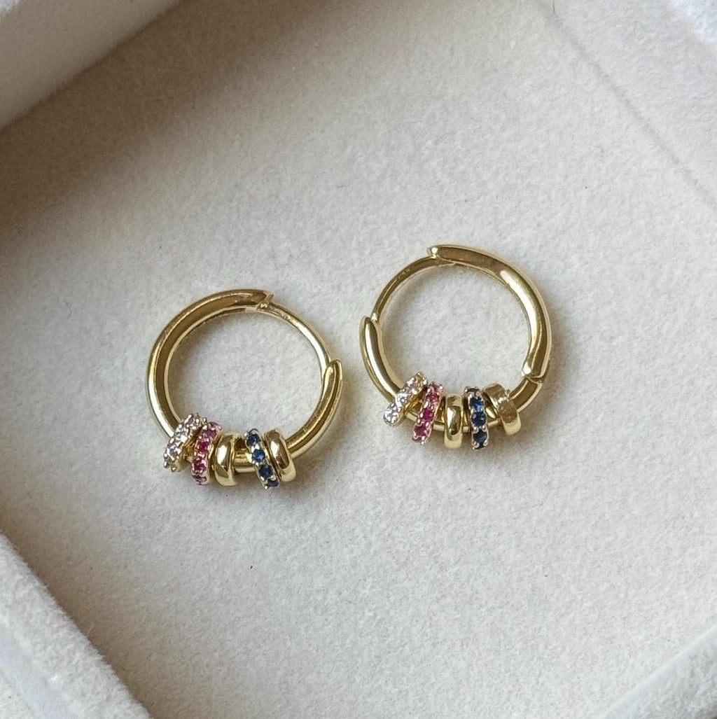 Gold hoop earrings with delicate pink blue and clear cubic zirconia beaded accents