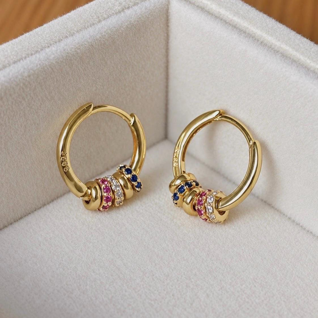 Pair of gold-plated 925 sterling silver hoop earrings with pink blue and clear CZ beaded charms
