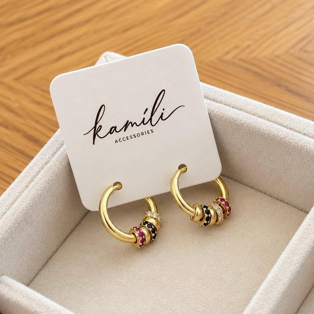 Gold CZ beaded hoop earrings displayed on Kamíli Accessories branded card