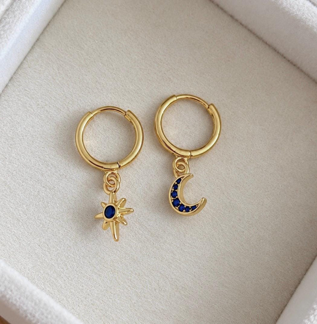 Pair of gold plated sterling silver blue CZ crescent moon and star hoop earrings