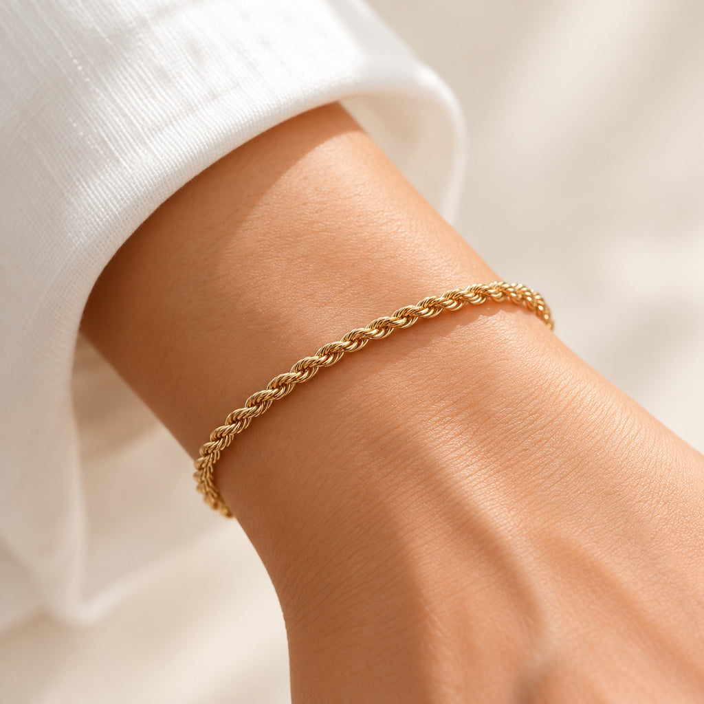 Delicate 3mm gold plated rope chain bracelet on wrist