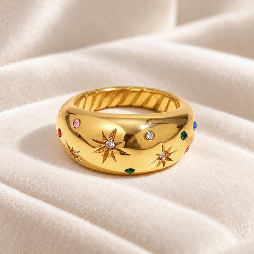 Gold starburst CZ dome ring showing multicoloured stones