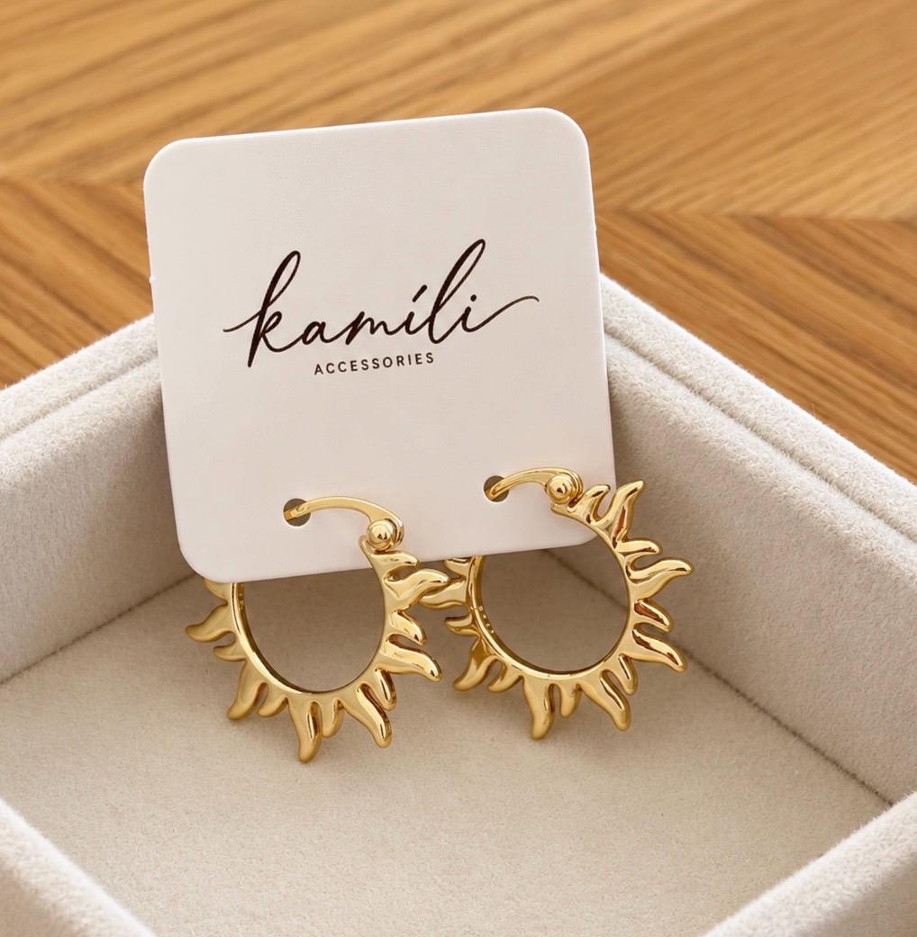 Gold plated 925 sterling silver sunburst hoop earrings displayed on Kamíli Accessories card