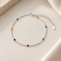 925 sterling silver rainbow bead bracelet with multicolour beads on ivory background